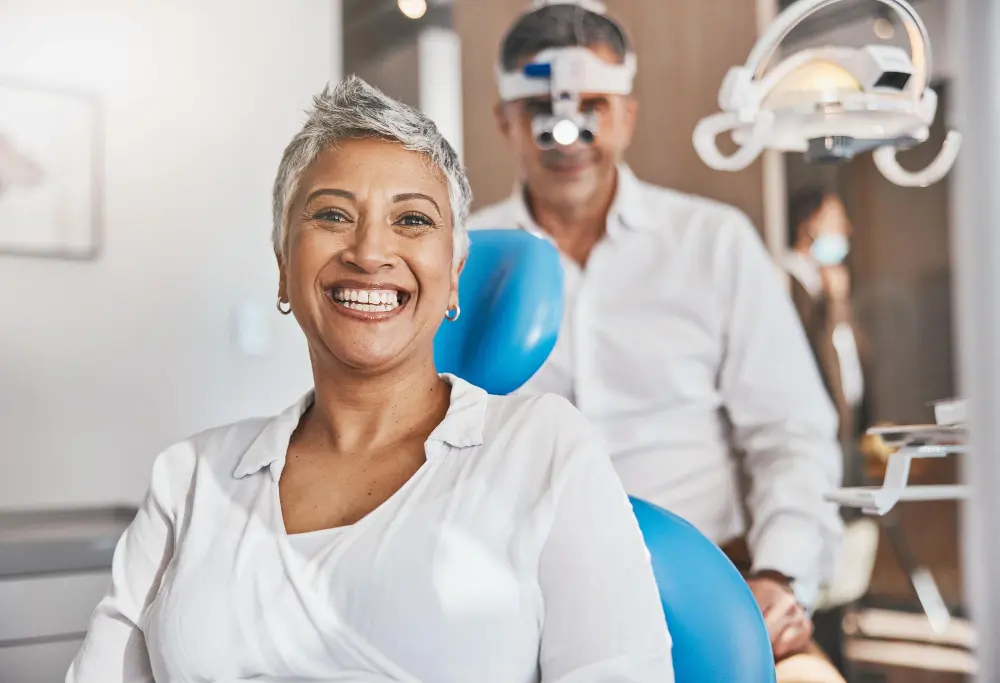 Older woman smiling while at the dentist